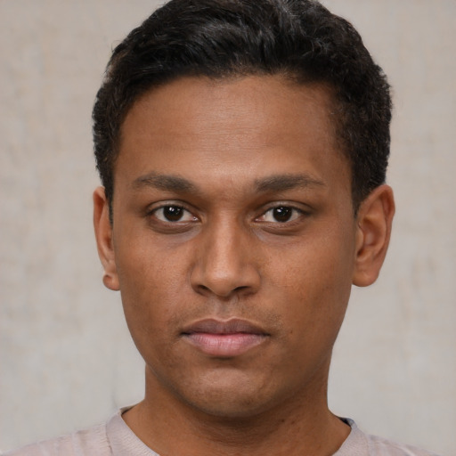 Neutral latino young-adult male with short  brown hair and brown eyes