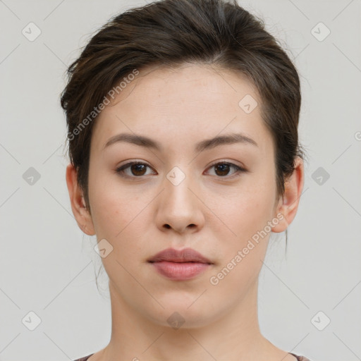 Neutral white young-adult female with short  brown hair and brown eyes