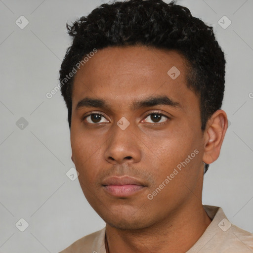 Neutral black young-adult male with short  black hair and brown eyes