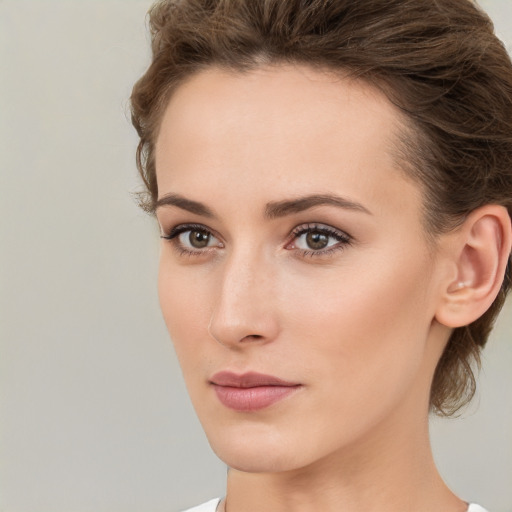 Neutral white young-adult female with medium  brown hair and brown eyes