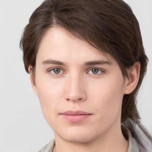 Neutral white young-adult male with medium  brown hair and brown eyes