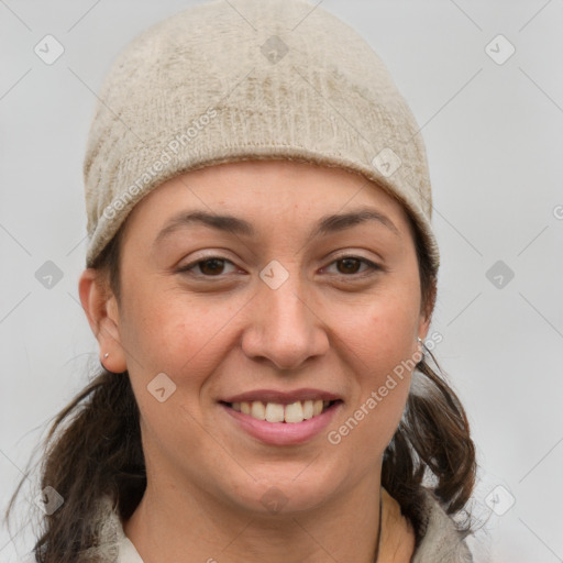 Joyful white young-adult female with medium  brown hair and grey eyes