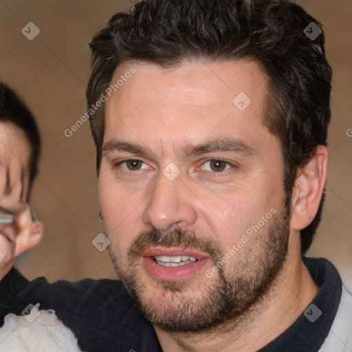 Joyful white adult male with short  brown hair and brown eyes