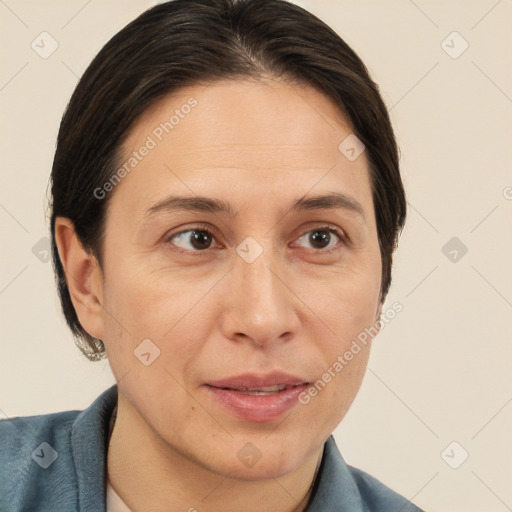 Joyful white adult female with short  brown hair and brown eyes