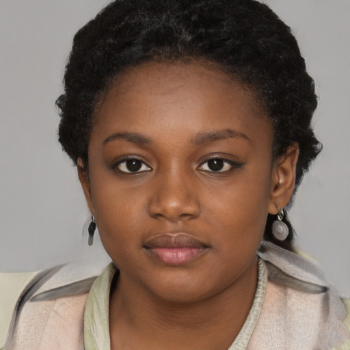 Neutral black young-adult female with short  black hair and brown eyes