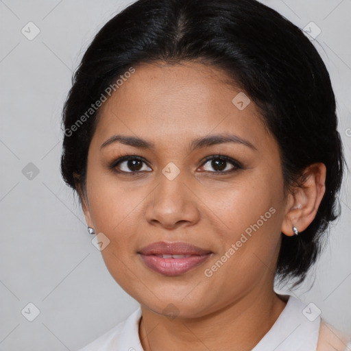 Joyful latino young-adult female with medium  brown hair and brown eyes