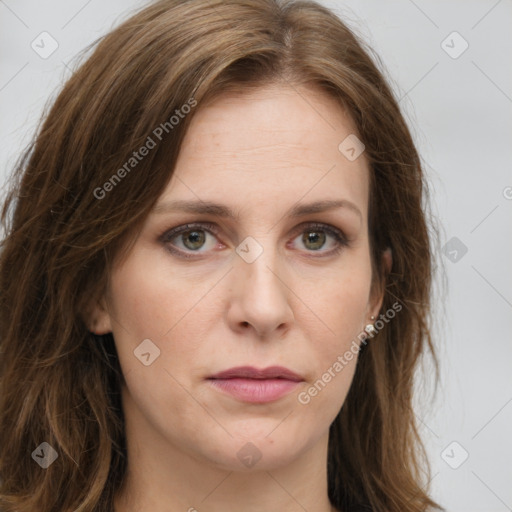 Joyful white young-adult female with long  brown hair and green eyes