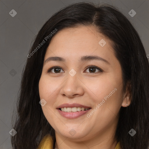 Joyful asian young-adult female with long  brown hair and brown eyes