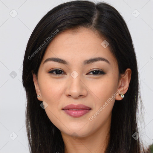 Joyful asian young-adult female with long  brown hair and brown eyes