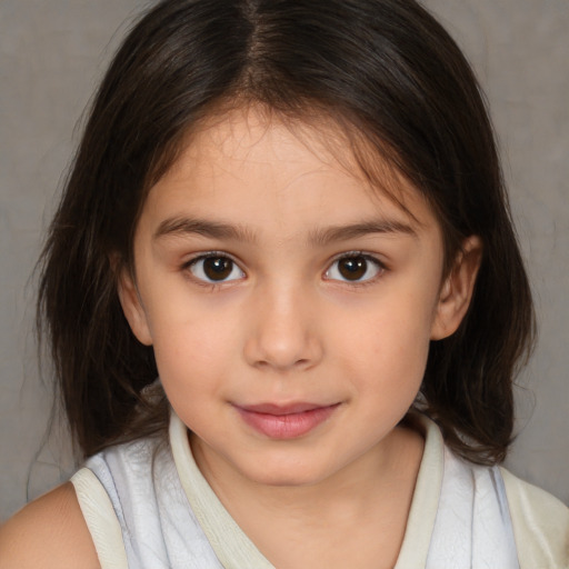 Joyful white child female with medium  brown hair and brown eyes