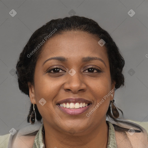 Joyful black young-adult female with medium  brown hair and brown eyes