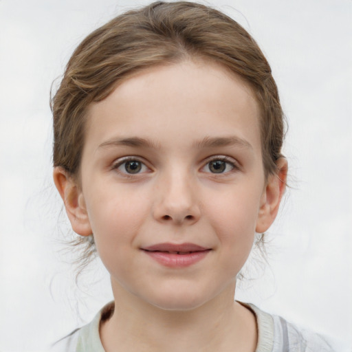 Joyful white child female with medium  brown hair and grey eyes