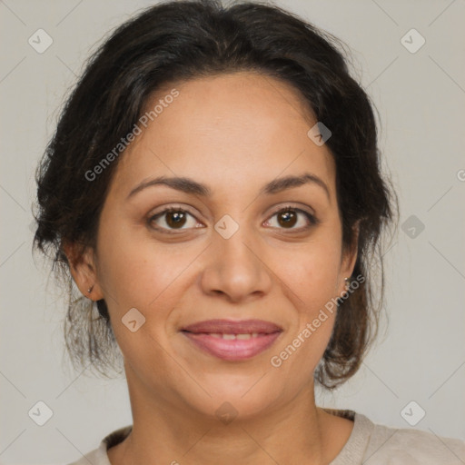 Joyful latino adult female with medium  brown hair and brown eyes