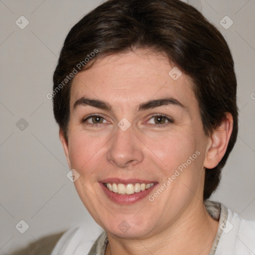 Joyful white young-adult female with medium  brown hair and green eyes