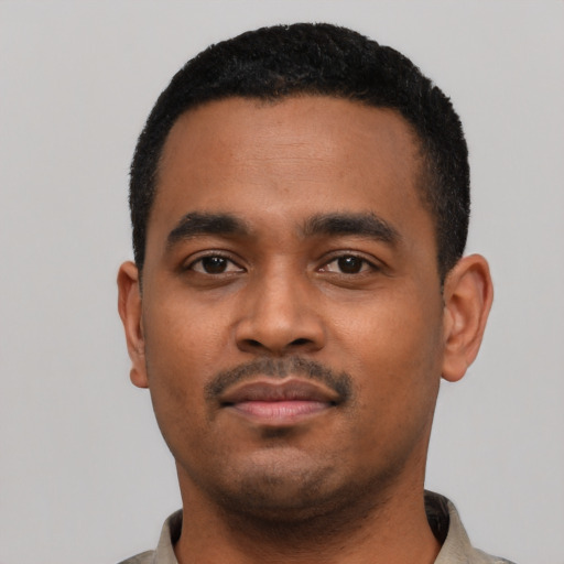 Neutral black young-adult male with short  black hair and brown eyes