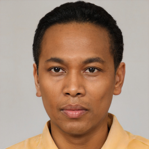 Neutral black young-adult male with short  black hair and brown eyes
