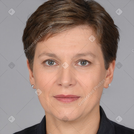 Joyful white adult female with short  brown hair and brown eyes