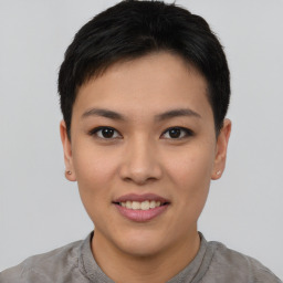 Joyful asian young-adult female with short  black hair and brown eyes