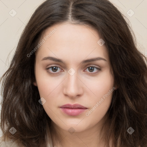 Neutral white young-adult female with long  brown hair and brown eyes