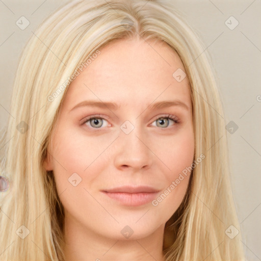 Joyful white young-adult female with long  brown hair and blue eyes