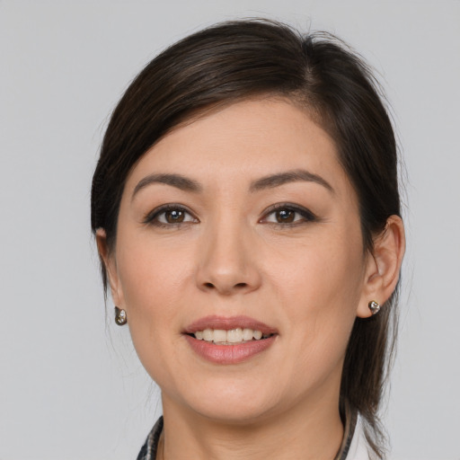 Joyful white young-adult female with medium  brown hair and brown eyes