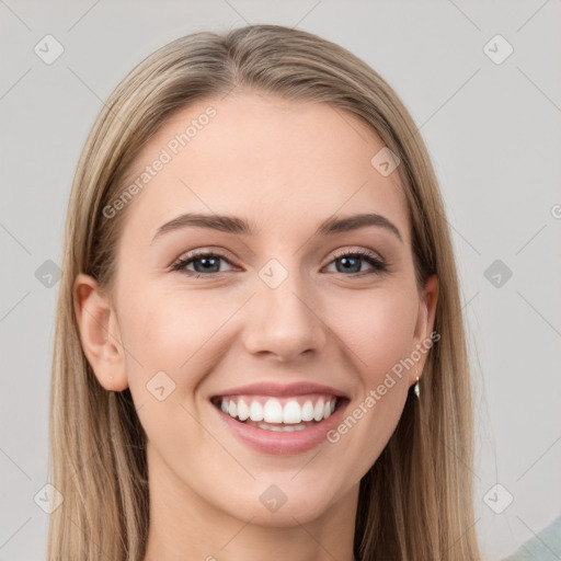 Joyful white young-adult female with long  brown hair and grey eyes