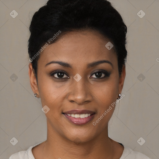 Joyful black young-adult female with short  black hair and brown eyes