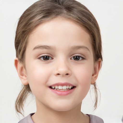 Joyful white child female with medium  brown hair and brown eyes