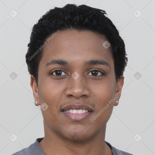 Joyful black young-adult female with short  black hair and brown eyes