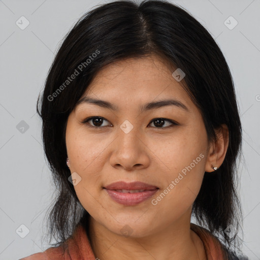 Joyful asian young-adult female with medium  brown hair and brown eyes