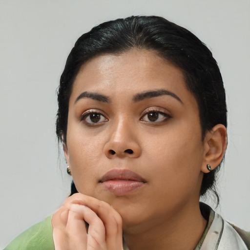 Neutral latino young-adult female with short  black hair and brown eyes