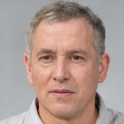 Neutral white middle-aged male with short  brown hair and brown eyes