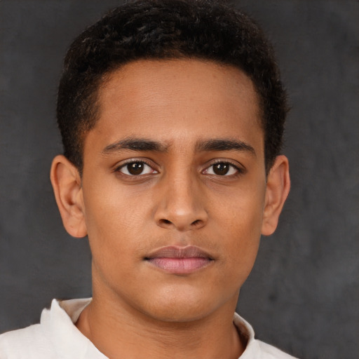 Neutral black young-adult male with short  brown hair and brown eyes