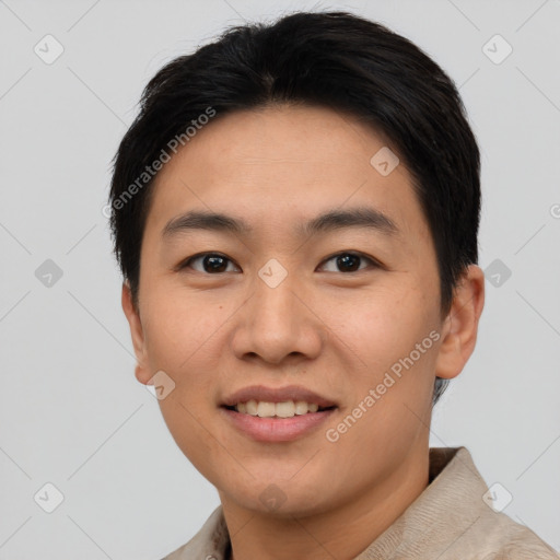 Joyful asian young-adult male with short  brown hair and brown eyes