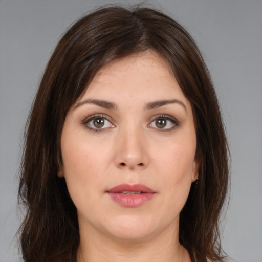 Neutral white young-adult female with medium  brown hair and brown eyes