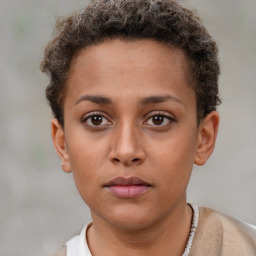 Neutral white young-adult female with short  brown hair and brown eyes