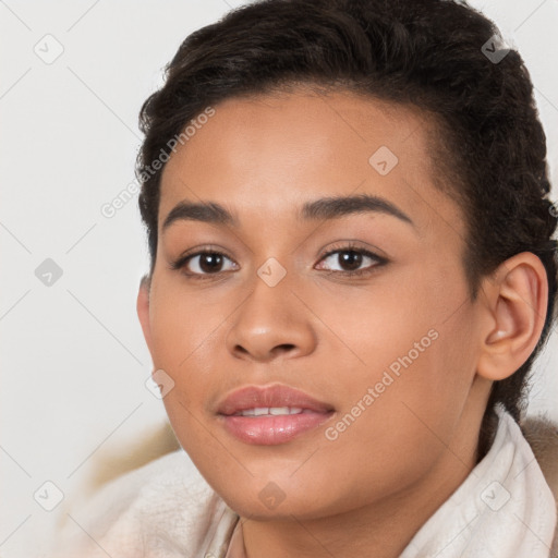 Joyful latino young-adult female with short  brown hair and brown eyes