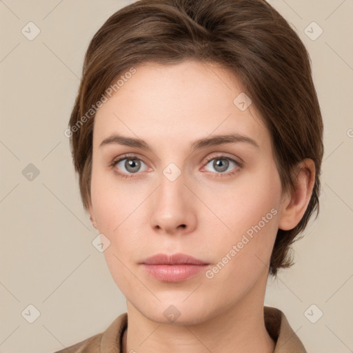 Neutral white young-adult female with medium  brown hair and grey eyes