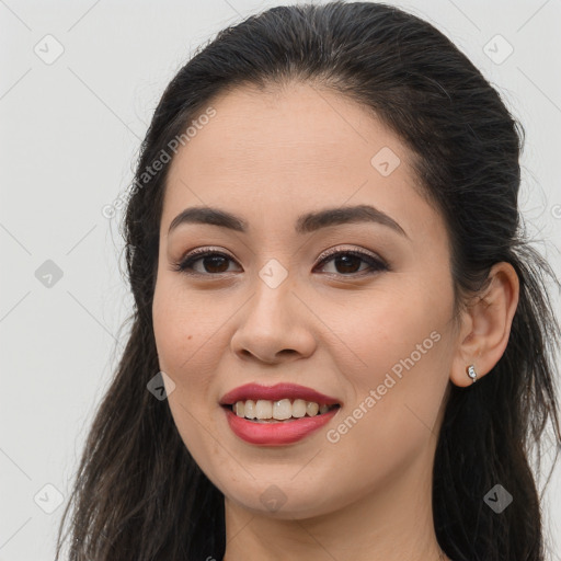 Joyful white young-adult female with long  brown hair and brown eyes