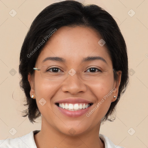 Joyful latino young-adult female with medium  brown hair and brown eyes