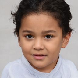 Joyful white child female with short  brown hair and brown eyes