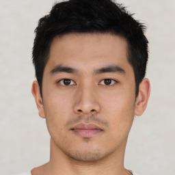 Neutral asian young-adult male with short  black hair and brown eyes