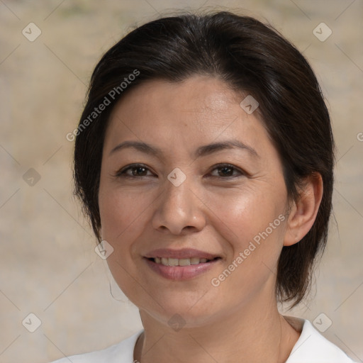 Joyful white adult female with medium  brown hair and brown eyes