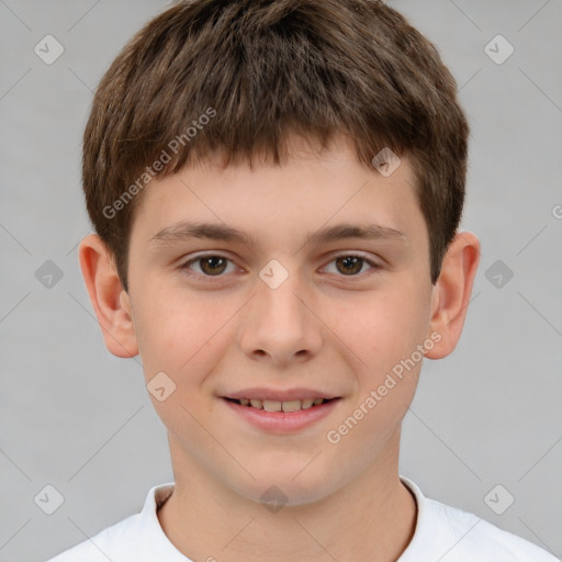 Joyful white child male with short  brown hair and brown eyes