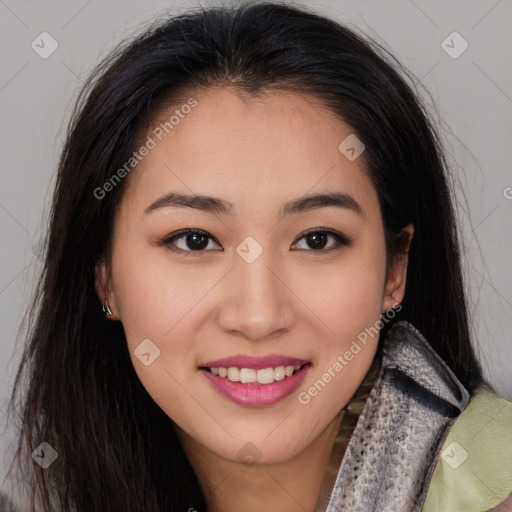 Joyful asian young-adult female with long  brown hair and brown eyes