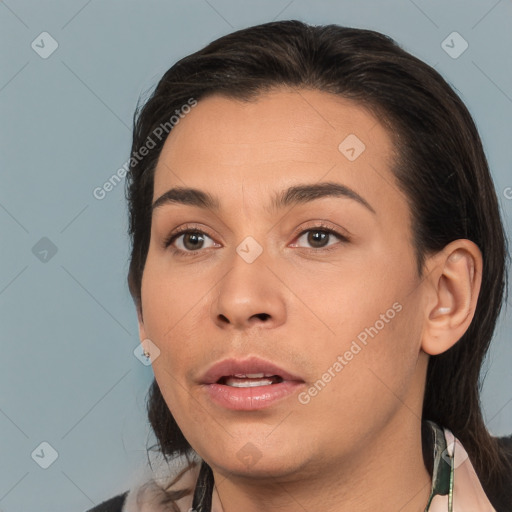 Joyful white young-adult female with medium  black hair and brown eyes