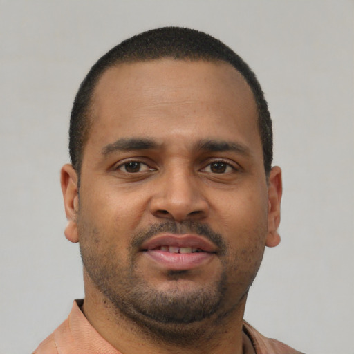 Neutral latino young-adult male with short  brown hair and brown eyes