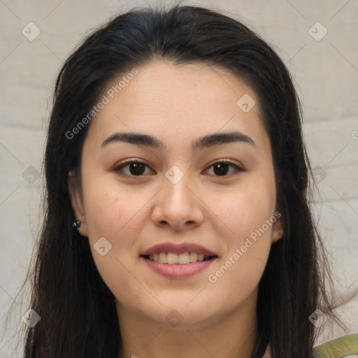 Joyful asian young-adult female with long  brown hair and brown eyes