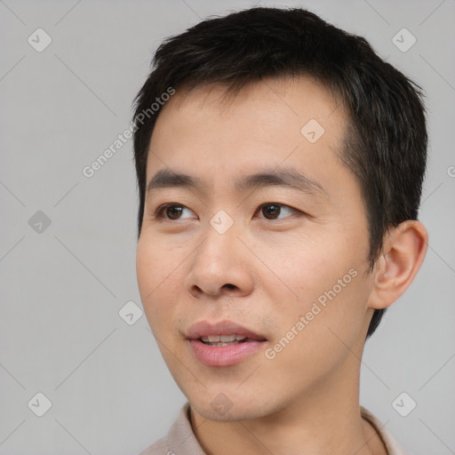 Neutral asian young-adult male with short  black hair and brown eyes