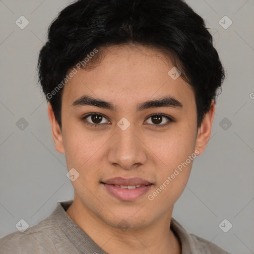 Joyful latino young-adult male with short  brown hair and brown eyes